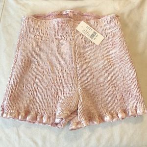 Pink peplum shorts by Lottie Moss